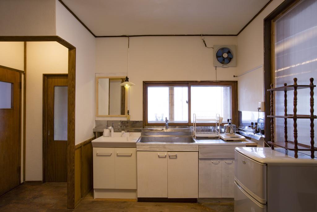Guest House Sato Shoten Toyoura Esterno foto